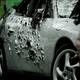 Image for article titled This is a Porsche with 10,000 bullet holes
